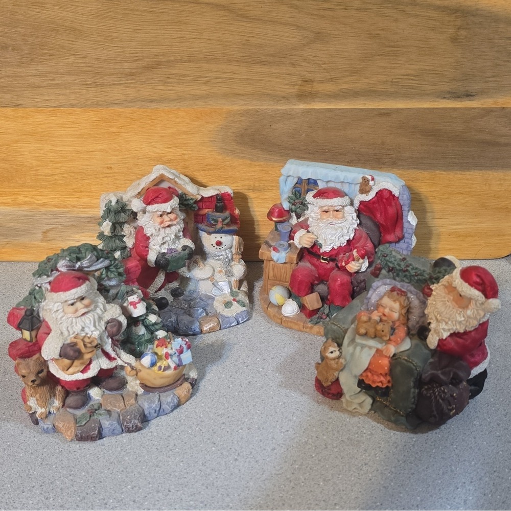 K's Collection Santa In Action Hand Painted Resin Christmas Figurines Set of 4